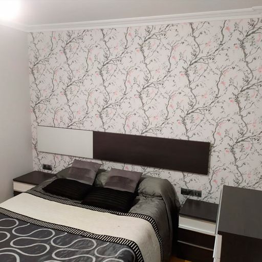 DecoSanpor 92 cama en habitación decorada